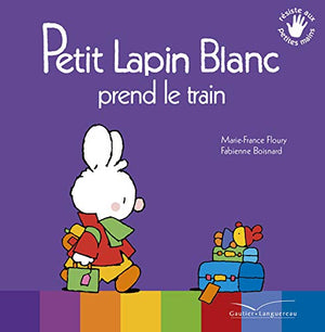 Petit lapin blanc prend le train