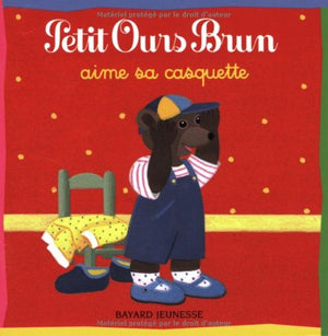 Petit ours brun aime sa casquette